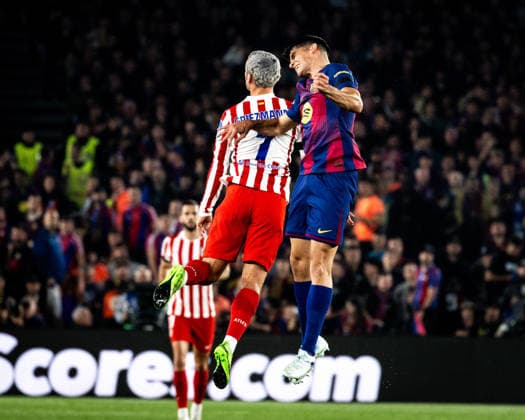 April 8, 2026, Barcelona, Barcelona, Spain: Antoine Griezmann (L) of Atletico de Madrid challenges for the ball with Gerard Martin (R) of FC Barcelona, Barca during the UEFA Champions League Quarter Final match between FC Barcelona and Atletico de Madrid at Spotify Camp Nou on APRIL 8, 2026 in Barcelona, Spain. Barcelona Spain - ZUMAs316 20260408_znp_s316_021 Copyright: xMartixSeguraxRamonedax
