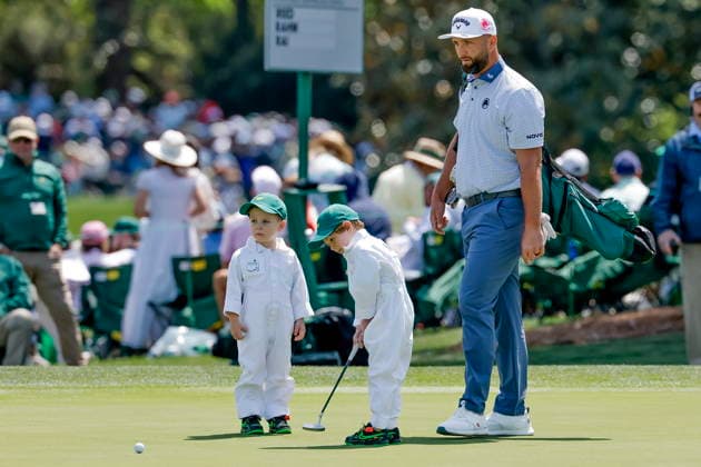 2026 Masters Tournament - Par 3 Contest Jon Rahm (R) of Spain supervises his sons Kepa (C) and Eneko (L) putting on the first hole during the Par 3 Contest during the 2026 Masters Tournament at the Augusta National Golf Club in Augusta, Georgia, USA, 08 April 2026. The Masters golf tournament begins 09 April 2026. AUGUSTA GEORGIA United States  Copyright: xERIKxS.xLESSERx