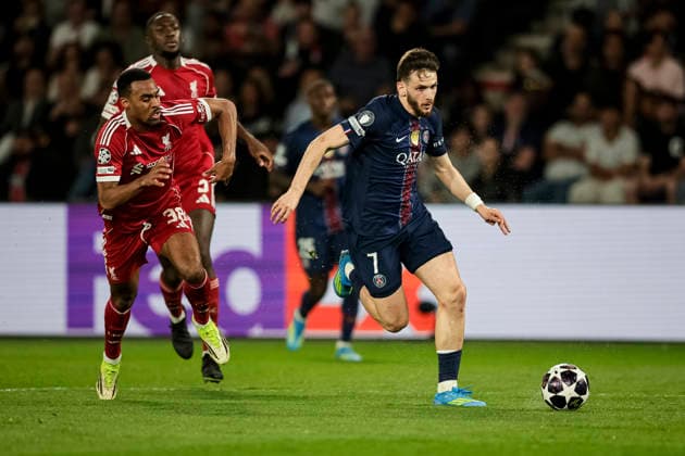 Paris, France April 8 Khvicha Kvaratskhelia of Paris Saint Germain R dribbles against Ryan Gravenberch of Liverpool L during the UEFA Champions League 2025 26 Quarter Final First Leg match between Paris Saint Germain FC and Liverpool FC at Parc des Princes on April 8, 2026 in Paris, France Photo by JustPictures Paris Parc des Princes France Copyright: x x2026xEurasiaxSportxImagesx jp-en-EuSpIm-AB6_PSG_Liverpool_08Apr2026_PR330