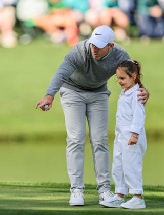 260408 Rory McIlroy of Northern Ireland with his daughter Poppy during the Par Three Contest prior to the 2026 Masters Golf Tournament on April 8, 2026 in Augusta Photo Petter Arvidson BILDBYRAN kod PA PA1192 golf masters bbeng the masters augusta  Copyright: PETTERxARVIDSON BB260408PA119