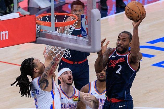 April 8, 2026, Inglewood, California, USA: Kawhi Leonard 2 of the Los Angeles Clippers puts up a shot during a 2026 NBA, Basketball Herren, USA regular season game against the Oklahoma City Thunder on Wednesday April 8, 2026 at Intuit Dome Arena in Inglewood, California. JAVIER ROJAS PI Inglewood USA - ZUMAp124 20260408_zaa_p124_014 Copyright: xJavierxRojasx