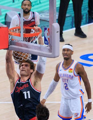 April 8, 2026, Inglewood, California, USA: Brook Lopez 11 of the Los Angeles Clippers dunks the ball during a 2026 NBA, Basketball Herren, USA regular season game against the Oklahoma City Thunder on Wednesday April 8, 2026 at Intuit Dome Arena in Inglewood, California. JAVIER ROJAS PI Inglewood USA - ZUMAp124 20260408_zaa_p124_020 Copyright: xJavierxRojasx