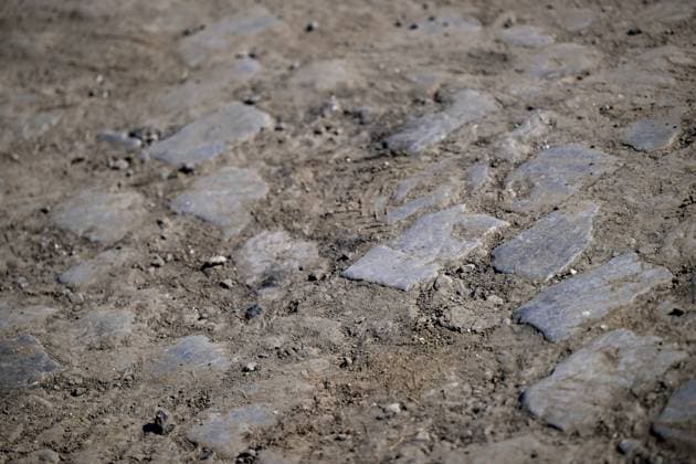 Illustration picture shows the cobbles during the reconnaissance of the track ahead of this year s Paris-Roubaix cycling race, Thursday 09 April 2026, around Roubaix, France. The 123rd edition of Paris-Roubaix cycling races will take on Sunday, with the women riding 143,1 km the men riding 258,3 km on Sunday. DIRKxWAEM  x170264485x