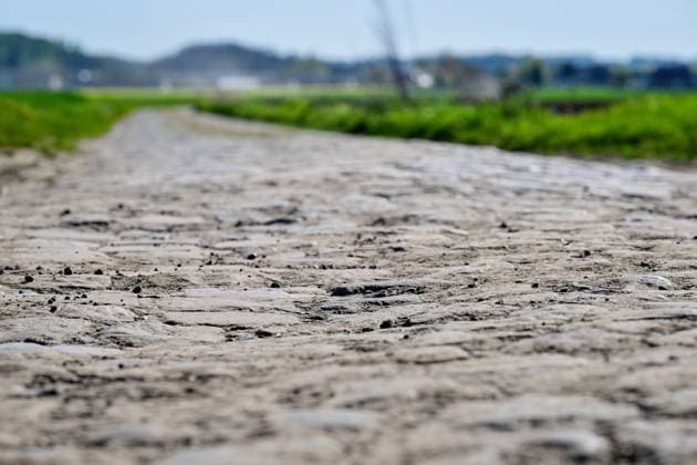 A cobblestone sector pictured during the reconnaissance of the track ahead of this year s Paris-Roubaix cycling race, Thursday 09 April 2026, around Roubaix, France. The 123rd edition of Paris-Roubaix cycling races will take on Sunday, with the women riding 143,1 km the men riding 258,3 km on Sunday. DIRKxWAEM  x170265171x