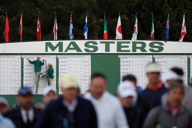 Patrons arrive for the opening ceremony before the start of the first day of the Masters Tournament at Augusta National Golf Club on Thursday, Aprill 9, 2026, in Augusta, Georgia.  AUG20260409801 JOHNxANGELILLO