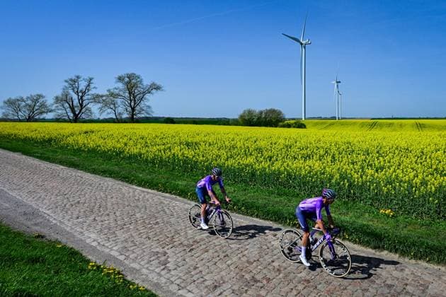 Team Jayco AIUIa riders pictured in action during the reconnaissance of the track ahead of this year s Paris-Roubaix cycling race, Thursday 09 April 2026, around Roubaix, France. The 123rd edition of Paris-Roubaix cycling races will take on Sunday, with the women riding 143,1 km the men riding 258,3 km on Sunday. DIRKxWAEM  x170281312x