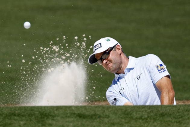 Golf 2026 Masters Tournament - Round 1 Corey Conners of Canada hits from the bunker on hole 2 during Round 1 of the 2026 Masters tournament in August, Georgia, USA, 09 April 2026. Augusta United States  Copyright: xERIKxS.xLESSERx