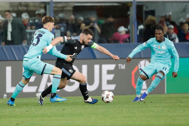 RECORD DATE NOT STATED 9th April 2026; Stadio Renato Dall Ara, Bologna, Italy, UEFA Europa League Football, Bologna versus Aston Villa; John McGinn of Aston Villa FC under pressure from Juan Miranda of Bologna FC EmanuelexPennacchio