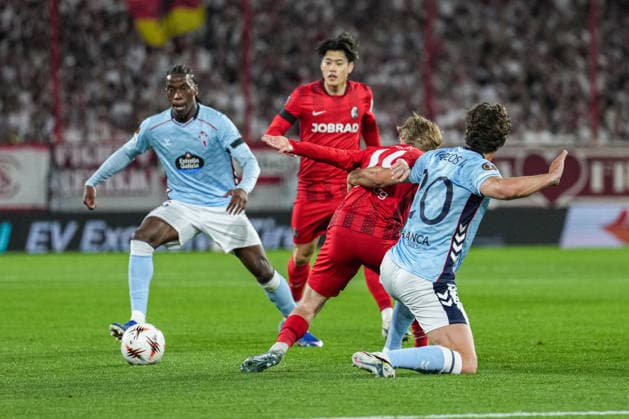 UEFA Europa League SC Freiburg vs RC Celta Vigo, 09 04 2026 Duel between Jan Niklas Beste SC Freiburg, 19 and Marcos Alonso RC Celta Vigo, 20 UEFA Europa League SC Freiburg vs RC Celta Vigo, Europa Park Stadium, 09 04 2026 Copyright: xBEAUTIFULxSPORTS Boscox