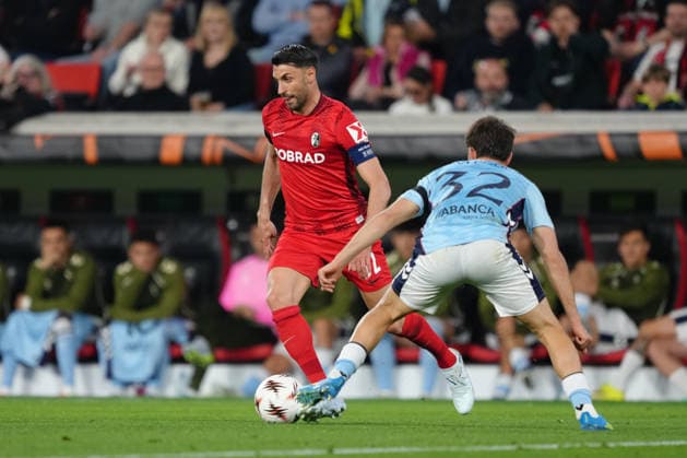 Germany UEFA Europa League quarter-final first leg 2025 26, SC Freiburg vs Celta Vigo Europa Park Stadium, Freiburg im Breisgau Vincenzo Grifo 32 Freiburg in duel with Javi Rodriguez 32 Celta Copyright: xKjetilxWaberx