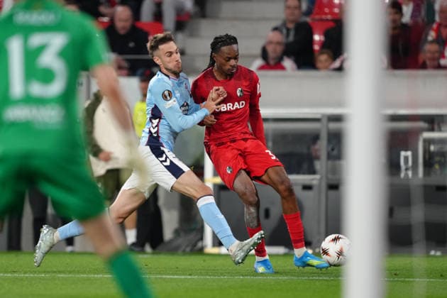 Germany UEFA Europa League quarter-final first leg 2025 26, SC Freiburg vs Celta Vigo Europa Park Stadion, Freiburg im Breisgau Oscar Mingueza 3 Celta in duel with Jordy Makengo 33 Freiburg Copyright: xKjetilxWaberx