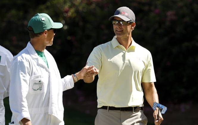Golf 2026 Masters Tournament - Round 1 Adam Scott of Australia reacts with caddie John Limanti after an eagle putt on hole 13 in Round 1 of the 2026 Masters tournament in August, Georgia, USA, 09 April 2026. Augusta United States  Copyright: xERIKxS.xLESSERx