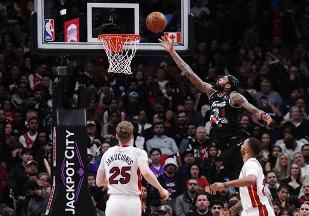 April 9, 2026, Toronto, On, CANADA: Toronto Raptors Brandon Ingram (3) scores as Miami Heat s Kasparas Jakucionis (25) and Norman Powell (24) look on during second half NBA, Basketball Herren, USA basketball action in Toronto on Thursday, April 9, 2026. Canada News - April 9, 2026  - ZUMAc35_ 20260409_zaf_c35_083 Copyright: xNathanxDenettex
