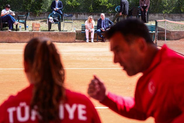 Billie Jean King Cup - Day 4 - Turkiye v Latvia Haldun Koc, Turkish ambassador in Portugal, watches Ada Kumru of Turkey compete in the Billie Jean King Cup play-offs women s singles match against Latvia on day four of the Billie Jean King Cup play-offs at Clube de Tenis do Jamor in Lisbon, Portugal, on April 10, 2026. Lisbon Lisboa Portugal  Copyright: xMiguelxReisx originalFilename:reis-notitle260410_npsSc.jpg
