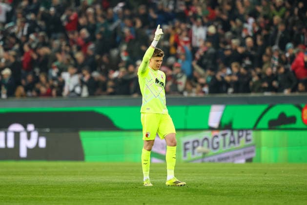 Finn Dahmen (FC Augsburg, 01) bejubelt das Tor zum 1:0, GER, FC Augsburg vs. TSG 1899 Hoffenheim, Fussball, Bundesliga, 29. Spieltag, Saison 2025 2026, 10.04.2026, DFL DFB REGULATIONS PROHIBIT ANY USE OF PHOTOGRAPHS as IMAGE SEQUENCES and or QUASI-VIDEO, GER, FC Augsburg vs. TSG 1899 Hoffenheim, Fussball, Bundesliga, 29. Spieltag, Saison 2025 2026, 10.04.2026 Augsburg *** Finn Dahmen FC Augsburg, 01 celebrates the goal to 1 0, GER, FC Augsburg vs TSG 1899 Hoffenheim, Football, Bundesliga, Matchday 29, Season 2025 2026, 10 04 2026, DFL DFB REGULATIONS PROHIBIT ANY USE OF PHOTOGRAPHS as IMAGE SEQUENCES and or QUASI VIDEO, GER, FC Augsburg vs TSG 1899 Hoffenheim, Football, Bundesliga, Matchday 29, Season 2025 2026, 10 04 2026 Augsburg Copyright: xEibner-Pressefoto JennixMaulx EP_JML