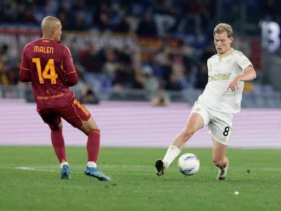 Italy: Serie a football match AS Roma vs Pisa Pisa™s Danish midfielder Malthe Hojholt challenges for the ball with Roma™s Dutch midfielder Donyell Malen during the Serie A football match between AS Roma vs Pisa at the Olimpico Stadium in Rome, Italy on April 10, 2026. _BPH5169 Copyright: xAntonioxBalascox