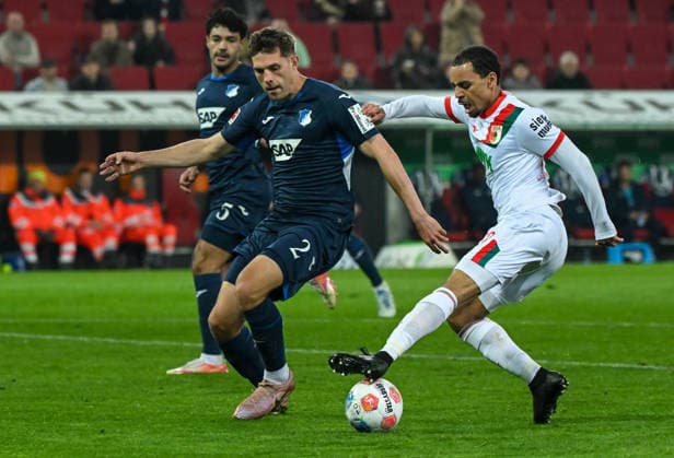 10.04.2026, xemx, Fussball 1.Bundesliga, FC Augsburg - TSG Hoffenheim v.l. Robin Hranac (TSG Hoffenheim), Alexis Claude-Maurice (FC Augsburg) Zweikampf, Aktion, action, battle for the ball (DFL DFB REGULATIONS PROHIBIT ANY USE OF PHOTOGRAPHS as IMAGE SEQUENCES and or QUASI-VIDEO) Augsburg *** 10 04 2026, xemx, Fussball 1 Bundesliga, FC Augsburg TSG Hoffenheim v l Robin Hranac TSG Hoffenheim , Alexis Claude Maurice FC Augsburg Zweikampf, Aktion, action, battle for the ball DFL DFB REGULATIONS PROHIBIT ANY USE OF PHOTOGRAPHS as IMAGE SEQUENCES and or QUASI VIDEO Augsburg
