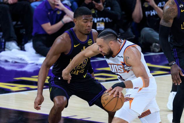 April 10, 2026, Los Angeles, California, USA: Dillon Brooks 3 of the Phoenix Suns drives past Rui Hachimura 28 of the Los Angeles Lakers during their regular season NBA, Basketball Herren, USA game on Friday April 10, 2026 at Crypto.com Arena in Los Angeles, California. Lakers defeat Suns, 101-73. ARIANA RUIZ PI Los Angeles USA - ZUMAp124 20260410_zaa_p124_041 Copyright: xArianaxRuizx
