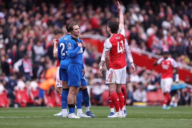 11th April 2026; Emirates Stadium, London, England; Premier League Football, Arsenal versus Bournemouth; Declan Rice of Arsenal gesturing to Marcus Tavernier of Bournemouth how Ryan Christie of Bournemouth hand was up for handball for the penalty kick awarded in the 33rd minute KatiexChan