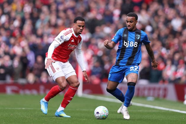 11th April 2026; Emirates Stadium, London, England; Premier League Football, Arsenal versus Bournemouth; Eli Junior Kroupi of Bournemouth passes under pressure from Gabriel of Arsenal KatiexChan