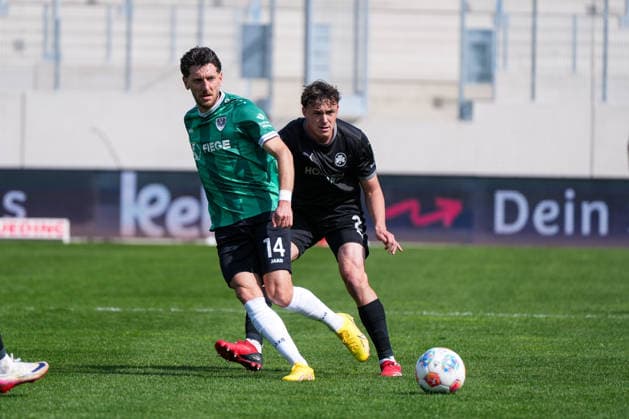 Germany Soccer 2 Bundesliga, Season 2025 26, Matchday 29, Preußen Münster vs SpVgg Greuther Fürth, 11 04 2026, LVM Preußenstadion Münster, North Rhine-Westphalia Charalambos Makridis Preußen Münster, 14 Lukas Reich SpVgg Greuther Fürth, 2 Copyright: xLeonxFrickx