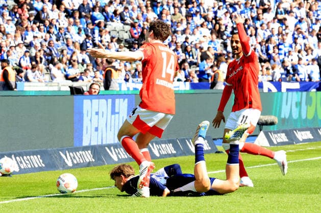 DEU, DFL, 2 FBL, Hertha BSC vs 1 FC Kaiserslautern, 11 04 2026, Berliner Olympiastadion, Berlin, DEU, DFL, 2 FBL, Hertha BSC vs 1 FC Kaiserslautern, in the picture Kennet Eichhorn Hertha BSC Berlin 23 , JACOB RASMUSSEN 1 FC Kaiserslautern 14 , Kenny Prince Redondo 1 FC Kaiserslautern 11 DFL regulations prohibit any use of Photographs as image sequences and or quasi video nordphotoxGmbHx xEngler nph00076
