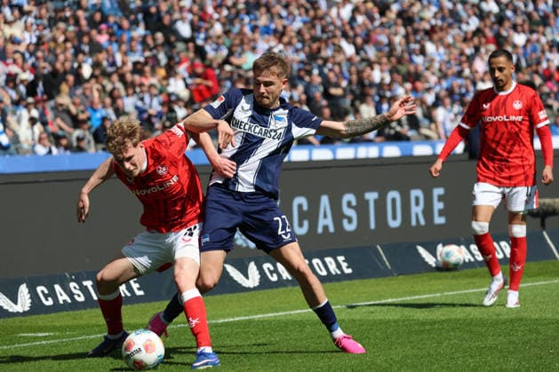BERLIN, DEUTSCHLAND - APRIL 11: Mika Haas (Kaiserslautern, 22) in the duel for the ball with Marten Winkler (Hertha, 22), during the match in the 2. German Bundesliga: Hertha BSC - 1. FC Kaiserslautern at Olympiastadion on matchday 29 on April 11, 2026 in Berlin, Deutschland. DFB regulations prohibit any use of photographs as image sequences and or quasi video. Berlin Deutschland Copyright: xO.Frankex