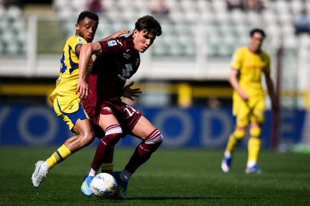 Torino FC v Hellas Verona FC - Serie A Cesare Casadei of Torino FC competes for the ball with Antoine Bernede of Hellas Verona FC during the Serie A football match between Torino FC and Hellas Verona FC. Turin Italy Copyright: xNicolòxCampox