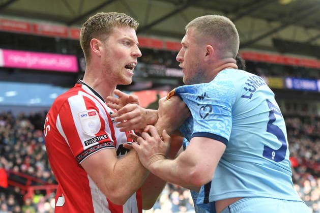 Sheffield United v Hull City, EFL Sky Bet Championship Hull City midfielder John Lundstram (5) and Sheffield United defender Mark McGuinness (25) remonstrate with each other during the EFL Sky Bet Championship match between Sheffield United and Hull City at Bramall Lane, Sheffield, UK on 11 April 2026. Sheffield Bramall Lane South Yorkshire UK Editorial use only DataCo restrictions apply See www.football-dataco.com , Copyright: xIanxLyallx PSI-24068-0039