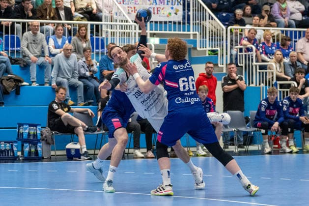 Duel between Dominik Claus SG BBM Bietigheim, 07 and Julius Hein TSV Bayer Dormagen, 66 TSV Bayer Dormagen vs SG BBM Bietigheim, Handball, 2 HBL, Matchday 27, Season 2025 2026, 11 04 2026 TSV Bayer Dormagen vs SG BBM Bietigheim, Handball, 2 HBL, Matchday 27, Season 2025 2026, 11 04 2026 Dormagen Copyright: xEibner-Pressefoto ThomasxHaeslerx EP_THR