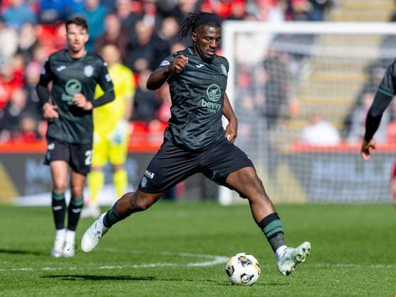 Rocky Bushiri of Hibernian during the Aberdeen v Hibernian William Hill Premiership fixture at Pittodrie Stadium on Saturday 11th April 2026 Aberdeen v Hibernian, William Hill Scottish Premiership, Football, Pittodrie, Aberdeen, Scotland, UK - 11 Apr 2026Aberdeen Pittodrie United Kingdom EDITORIAL USE ONLY No use with unauthorised audio, video, data, fixture lists, club league logos or live services. Online in-match use limited to 120 images, no video emulation. No use in betting, games or single club league player publications.  Copyright: xAlanxRennie Shutterstockx 16823419gy