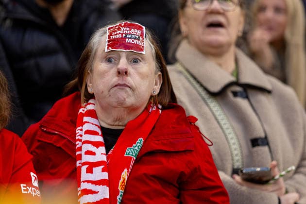 Football - FA Premier League - Liverpool FC v Fulham FC LIVERPOOL, ENGLAND - Saturday, April 11, 2026: A Liverpool supporter with a sticker We are Liverpool, this costs more in relation to a fan protest about rising ticket prices during the FA Premier League match between Liverpool FC and Fulham FC at Anfield. (Photo by David Rawcliffe Propaganda) LIVERPOOL Anfield MERSEYSIDE ENGLAND  Copyright: xDavidxRawcliffex P2026-04-11-Liverpool_Fulham-84