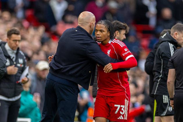 Football - FA Premier League - Liverpool FC v Fulham FC LIVERPOOL, ENGLAND - Saturday, April 11, 2026: Liverpool s Rio Ngumoha is greeted by head coach Arne Slot (L) as he is substituted off during the FA Premier League match between Liverpool FC and Fulham FC at Anfield. (Photo by David Rawcliffe Propaganda) LIVERPOOL Anfield MERSEYSIDE ENGLAND  Copyright: xDavidxRawcliffex P2026-04-11-Liverpool_Fulham-89