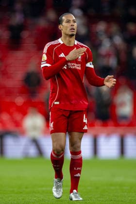 Football - FA Premier League - Liverpool FC v Fulham FC LIVERPOOL, ENGLAND - Saturday, April 11, 2026: Liverpool s captain Virgil van Dijk touches the badge in celebration after the FA Premier League match between Liverpool FC and Fulham FC at Anfield. The game ended 2-0. (Photo by David Rawcliffe Propaganda) LIVERPOOL Anfield MERSEYSIDE ENGLAND  Copyright: xDavidxRawcliffex P2026-04-11-Liverpool_Fulham-111