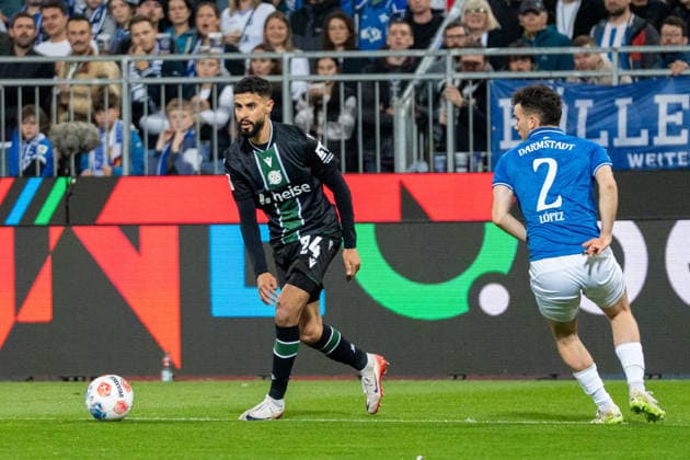 2 Bundesliga SV Darmstadt 98 vs Hannover 96, 11 04 2026 On the ball Elias Saad Hannover 96, 24 2 Bundesliga SV Darmstadt 98 vs Hannover 96, Merck Stadion am Böllenfalltor, 11 04 2026 DFB DFL REGULATIONS PROHIBIT ANY USE OF PHOTOGRAPHS AS IMAGE SEQUENCES AND OR QUASI VIDEO Copyright: xBEAUTIFULxSPORTS Hillx