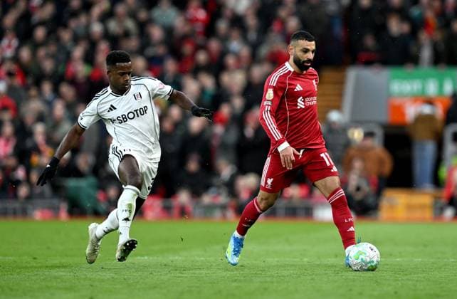 Ryan Sessegnon of Fulham and Mohamed Salah of Liverpool Liverpool v Fulham, Premier League, Football, Anfield, Liverpool, UK - 11 Apr 2026Liverpool Anfield United Kingdom EDITORIAL USE ONLY No use with unauthorised audio, video, data, fixture lists, club league logos or live services. Online in-match use limited to 120 images, no video emulation. No use in betting, games or single club league player publications. Copyright: xAnnaxGowthorpe Shutterstockx 16823590bn