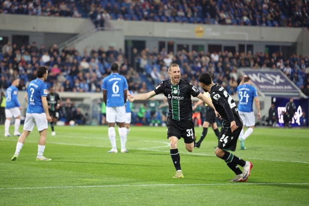 11 04 2026, xrekx, Fußball 2 Bundesliga, SV Darmstadt 98 Hannover 96 v l Torjubel nach dem Tor zum celebrating the goal celebrate 0 1 durch Maurice Neubauer Hannover 96 mit Elias Saad Hannover 96 DFL DFB REGULATIONS PROHIBIT ANY USE OF PHOTOGRAPHS as IMAGE SEQUENCES and or QUASI VIDEO Darmstadt