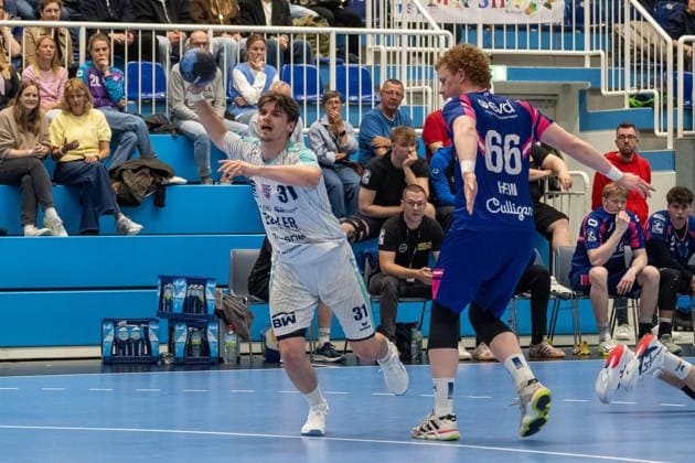 Duel between Alexander Pfeifer SG BBM Bietigheim, 31 and Julius Hein TSV Bayer Dormagen, 66 TSV Bayer Dormagen vs SG BBM Bietigheim, Handball, 2 HBL, Matchday 27, Season 2025 2026, 11 04 2026 TSV Bayer Dormagen vs SG BBM Bietigheim, Handball, 2 HBL, Matchday 27, Season 2025 2026, 11 04 2026 Dormagen Copyright: xEibner-Pressefoto ThomasxHaeslerx EP_THR