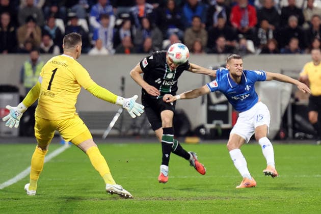 11 04 2026, xrekx, Soccer 2 Bundesliga, SV Darmstadt 98 Hannover 96 v l Marcel Schuhen SV Darmstadt 98 Benedikt Pichler Hannover 96 Fabian Nürnberger Nuernberger SV Darmstadt 98 Zweikampf, Aktion, action, battle for the ball DFL DFB REGULATIONS PROHIBIT ANY USE OF PHOTOGRAPHS as IMAGE SEQUENCES and or QUASI VIDEO Darmstadt