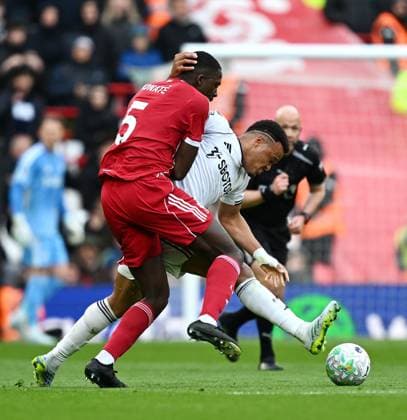 Ibrahima Konatà of Liverpool and Rodrigo Muniz of Fulham Liverpool v Fulham, Premier League, Football, Anfield, Liverpool, UK - 11 Apr 2026Liverpool Anfield United Kingdom EDITORIAL USE ONLY No use with unauthorised audio, video, data, fixture lists, club league logos or live services. Online in-match use limited to 120 images, no video emulation. No use in betting, games or single club league player publications. Copyright: xAnnaxGowthorpe Shutterstockx 16823590bw