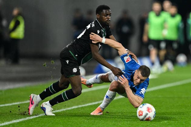 Noel Aseko Hannover 96, 15 in duel with Fabian Nürnberger SV Darmstadt 1898, 15 , GER, SV Darmstadt 98 vs Hannover 96, Soccer 2 Bundesliga, Matchday 29, Season 2025 2026, 11 04 2026 DFL regulations prohibit any use of photographs as image sequences and or quasi video GER, SV Darmstadt 98 vs Hannover 96, Soccer 2 Bundesliga, Matchday 29, Season 2025 2026, 11 04 2026 Darmstadt Copyright: xEibner-Pressefoto FlorianxWiegandx EP_FWD