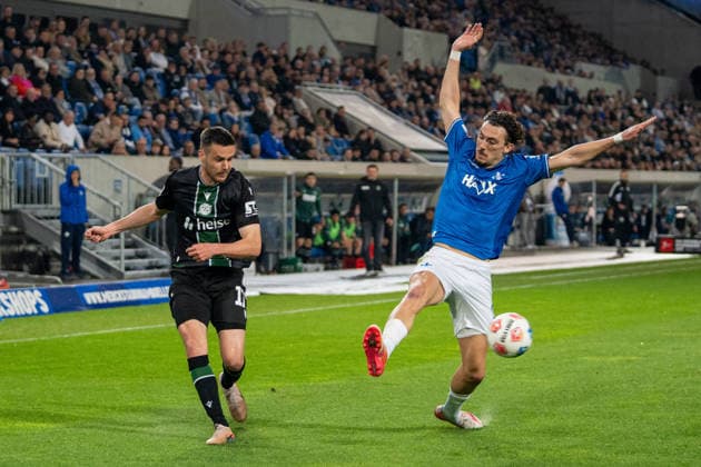2 Bundesliga SV Darmstadt 98 vs Hannover 96, 11 04 2026 duel between Bastian Allgeier Hannover 96, 17 and Fraser Hornby SV Darmstadt 98, 9 2 Bundesliga SV Darmstadt 98 vs Hannover 96, Merck Stadion am Böllenfalltor, 11 04 2026 DFB DFL REGULATIONS PROHIBIT ANY USE OF PHOTOGRAPHS AS IMAGE SEQUENCES AND OR QUASI VIDEO Copyright: xBEAUTIFULxSPORTS Hillx