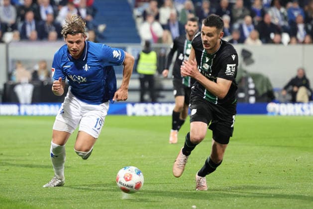 11 04 2026, xrekx, Fußball 2 Bundesliga, SV Darmstadt 98 Hannover 96 v l Fynn Lakenmacher SV Darmstadt 98 Bastian Allgeier Hannover 96 Zweikampf, Aktion, action, battle for the ball DFL DFB REGULATIONS PROHIBIT ANY USE OF PHOTOGRAPHS as IMAGE SEQUENCES and or QUASI VIDEO Darmstadt