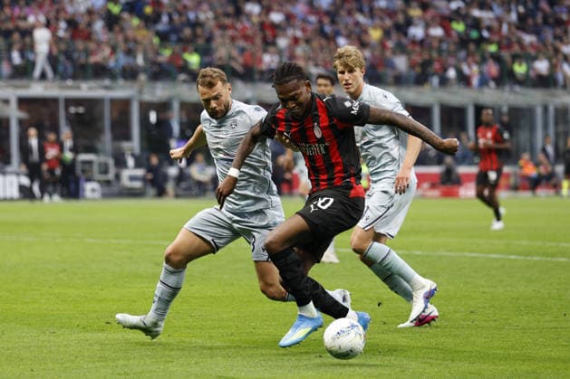 CALCIO - Serie A - AC Milan vs Udinese Calcio AC Milan s RAFAEL LEAO in action against Udinese s THOMAS KRISTENSEN during the Italian Serie A Enilive soccer championship football match between AC Milan and Udinese Calcio at San Siro Stadium on April 11th, 2026, Milan, Italy Milan Italy  Copyright: xIPAxSport ABACAx