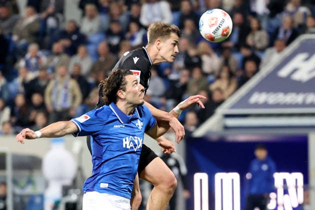 11 04 2026, xtvx, Fußball 2 Bundesliga, SV Darmstadt 98 Hannover 96 v l Zweikampf, Duell, duel, tackle, compete Fraser Hornby SV Darmstadt 98 Maik Nawrocki Hannover 96 DFL DFB REGULATIONS PROHIBIT ANY USE OF PHOTOGRAPHS as IMAGE SEQUENCES and or QUASI VIDEO Darmstadt