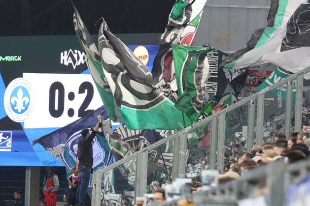 11 04 2026, xrekx, Soccer 2 Bundesliga, SV Darmstadt 98 Hannover 96 v l Final Score 0 2 Scoreboard, Videowall, Scoreboard, Info, Advertising Hannover Fans ,Mood, Scarves, Ultras, Spectators, Visitors, Choreo, Choreography, atmosphere, scarves, spectators, visitors DFL DFB REGULATIONS PROHIBIT ANY USE OF PHOTOGRAPHS as IMAGE SEQUENCES and or QUASI VIDEO Darmstadt