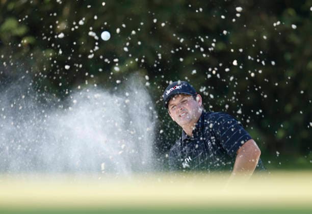 Patrick Reed hits out of a bunker to the 10th green during the third round of the Masters Tournament at Augusta National Golf Club on Saturday, April 11, 2026, in Augusta, Georgia.  AUG20260411826 JOHNxANGELILLO