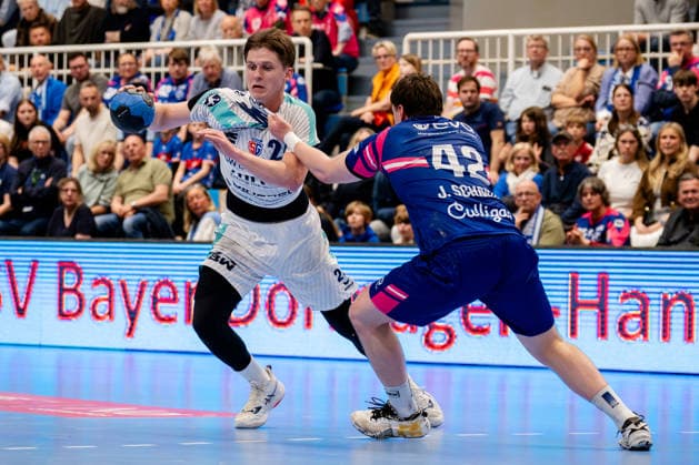 Dormagen, 11 04 2026, Handball, Men, 2 Bundesliga, 27 Matchday, 2025 2026 TSV Bayer Dormagen SG BBM Bietigheim Maxim Orlov SG BBM Bietigheim, 24 in duel with Jan Schmidt TSV Bayer Dormagen, 42 Dormagen TSV Bayer Sportcenter NRW Germany