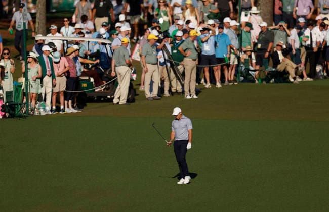 Rory McIlroy of Northern Ireland walks to the 15th green during the third round of the Masters Tournament at Augusta National Golf Club on Saturday, April 11, 2026, in Augusta, Georgia.  AUG20260411855 JOHNxANGELILLO
