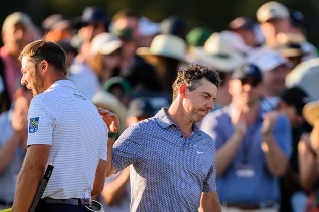 260411 Sam Burns of United States and Rory McIlroy of Northern Ireland on the 18th green after the third round of the 2026 Masters Golf Tournament on April 11, 2026 in Augusta Photo Petter Arvidson BILDBYRAN kod PA PA1195 golf masters bbeng the masters augusta depp  Copyright: PETTERxARVIDSON BB260411PA128